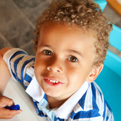boy smiling big