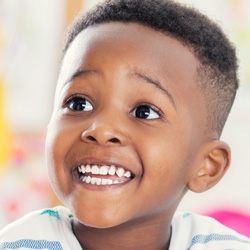 boy with a big smile on his face